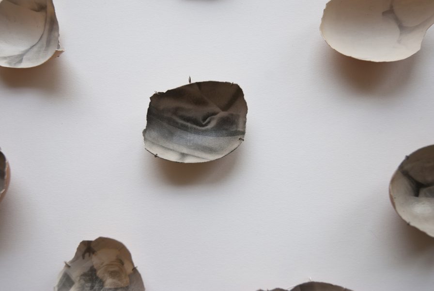 Untitled (Eggs), 2018-2019, pendant; eggshells, silver, silver thread
