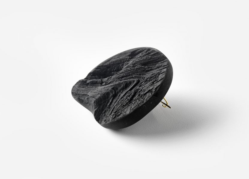 Brooch (lifespan 1/3), 2019, charcoal powder, corn starch, 18k Fair trade gold (Inner brooch)