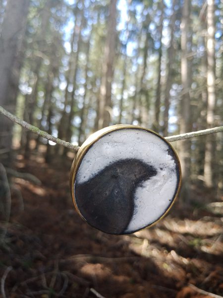 South Island Raven, 2019, brooch; brass, gypsum plaster, pigment, resin, steel pin