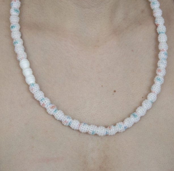 Pearl Necklace, 2019, necklace; yarn, plastic pearls, electric shrink tube necklace; yarn, plastic pearls, electric shrink tube