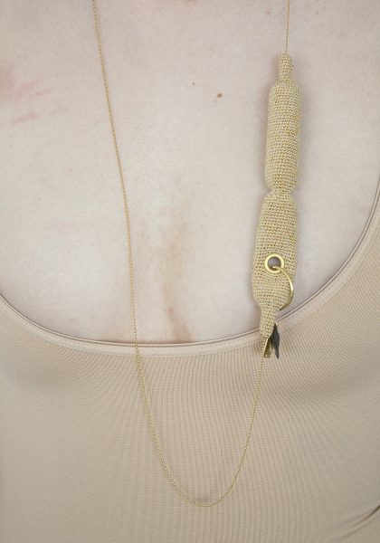 Microphallus, 2019, necklace; yarn, brass, gold leaf, ball chain